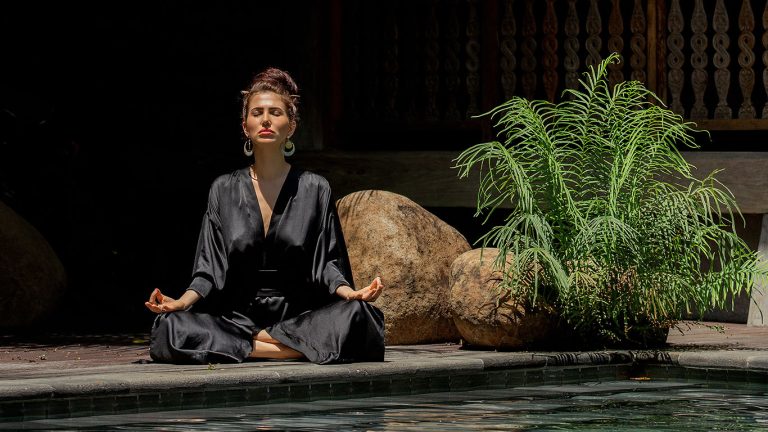 beautiful girl is engaged in meditation. high quality photo